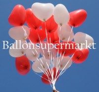 Doch so schön, wie diese Herzluftballons jetzt im Glanz der Hochzeitsfeier an den Bändern baumeln, hat man es sich nicht vorstellen können